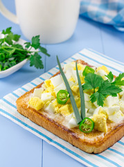 Breakfast sandwich with eggs and verdure