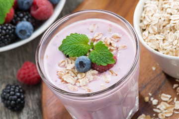 delicious berry smoothies with oatmeal, close-up, top view