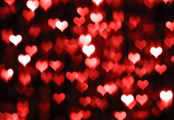 Abstract dark valentine background with red hearts