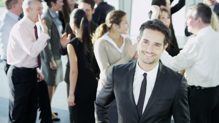 Attractive diverse business team in a light modern office building