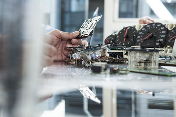 Men who are designing the speedometer