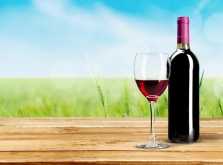 Wine Bottle. Red wine bottle and glass, isolated on white