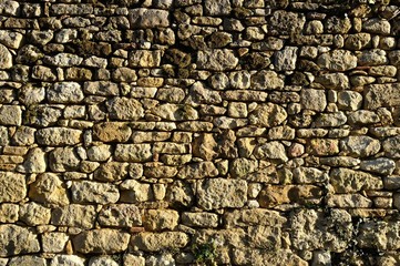 Solid wall made of stone