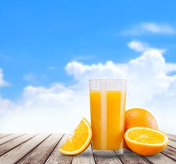 6474. Orange juice in glass with mint,  fresh fruits on wooden