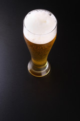 Tall glass of lager