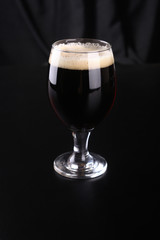 Glass of dark beer