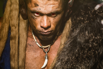 Close-up portrait of a strong man with a skin on his skin