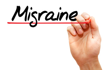 Hand writing Migraine with marker, health concept