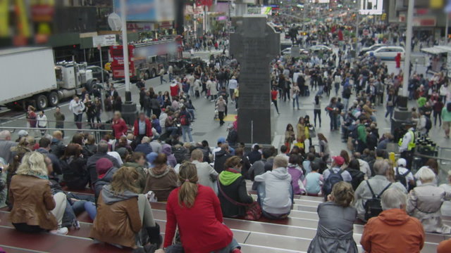 Crowds of tourists gather at Times Square in New York City