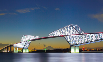 Naklejka premium Tokyo gate bridge and Mountain Fuji at twilight time