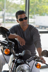 Plakat Fashionable man on motorcycle