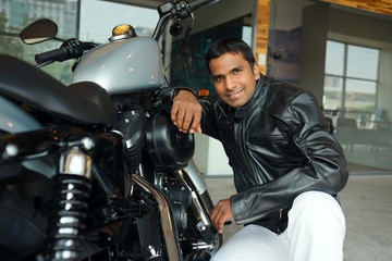 Fototapeta na wymiar Man with motorcycle