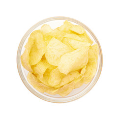 Multiple potato chips in a glass bowl
