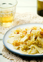 Noodles with stewed cabbage.