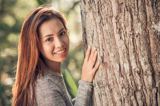 Adorable woman in the forest
