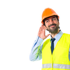 Workman listening something