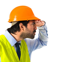 worker showing something over white background