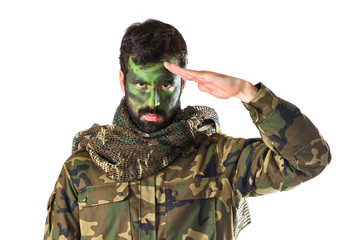 Soldier saluting over white background