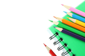 notebook and colored pencils
