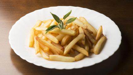 fried potatoes on the wooden table