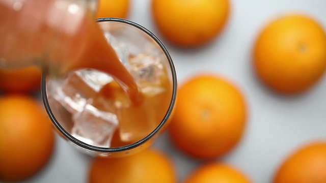 orange juice poured into a glass