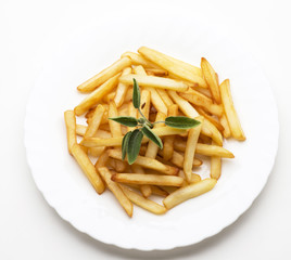 dish with fried potatoes isolated on white background