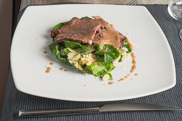 beef with salad and almond