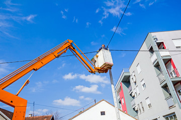Power line team at work on a pole
