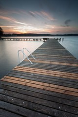 Lake landscape with jetty. Long time exposure