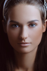 Obraz premium Young beautiful woman with perfect skin in nature makeup