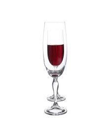 Full and empty champagne glasses with red wine