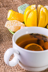 cup of green tea with lemon close-up