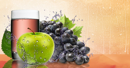 Ripe apples and grapes with a glass of juice.