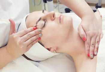 Obraz na płótnie Canvas massage and facial peels at the salon cosmetics