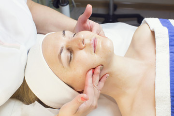 Obraz na płótnie Canvas massage and facial peels at the salon cosmetics