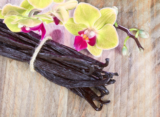 Vanilla sticks and orchid flower
