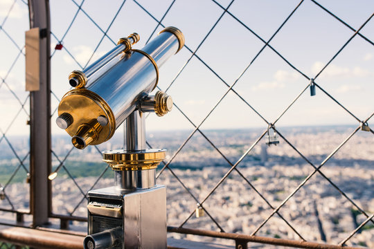 Binoculars at the top of Eiffel Tower in Paris, France. Filtered