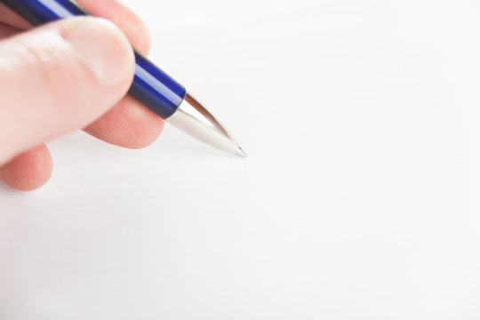 hand holding pen