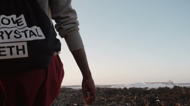African American hipster teen with a bag in Slow Motion