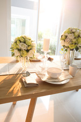 Wooden table setting and decoration for meal time