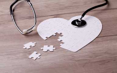 Stethoscope and puzzle, concept of Solution