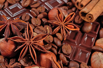 Coffee, chocolate, star anise, hazelnuts and cinnamon sticks clo