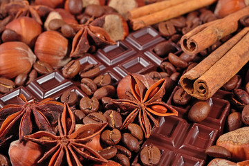 Coffee, chocolate, star anise, hazelnuts and cinnamon sticks clo