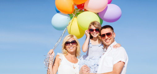 family with colorful balloons