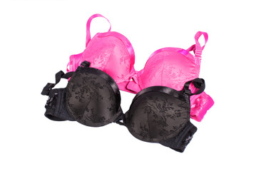Pink and black bras isolated on white background