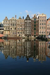 Fotobehang Amsterdam Hausfassaden Spiegelung Damrak © Rainer Schmitten
