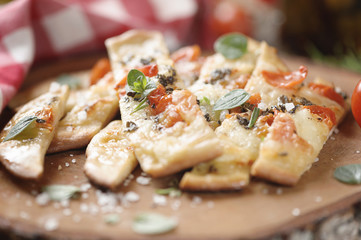Pizza with cherry tomatoes and cheese