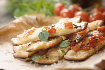 Pizza with cherry tomatoes and cheese