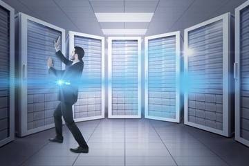 Composite image of businessman standing and pushing up