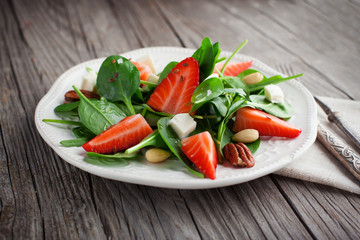 Spring salad with spinach leaves